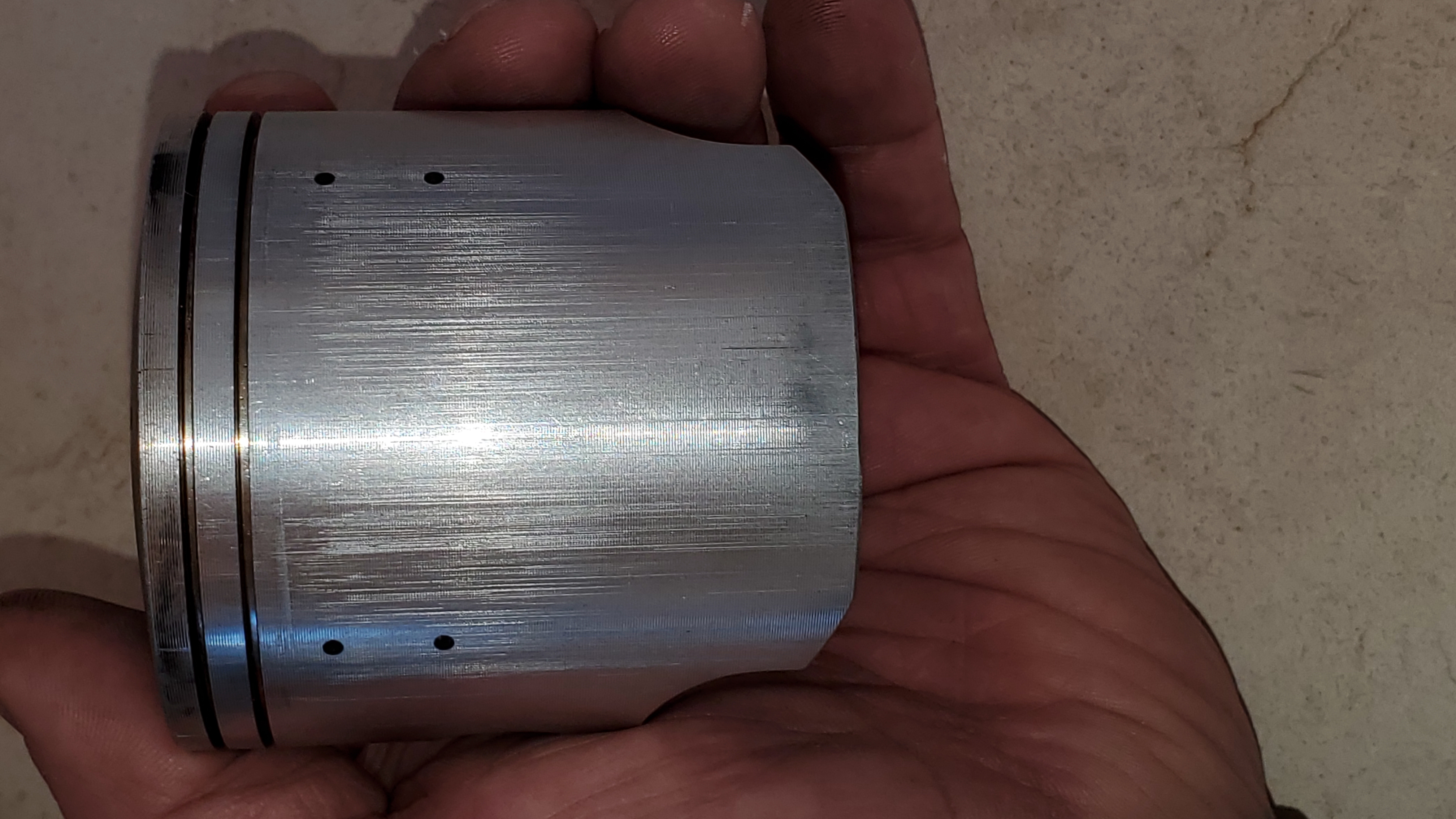 New piston exhaust side from replated cylinder both at just 10 hours. #2