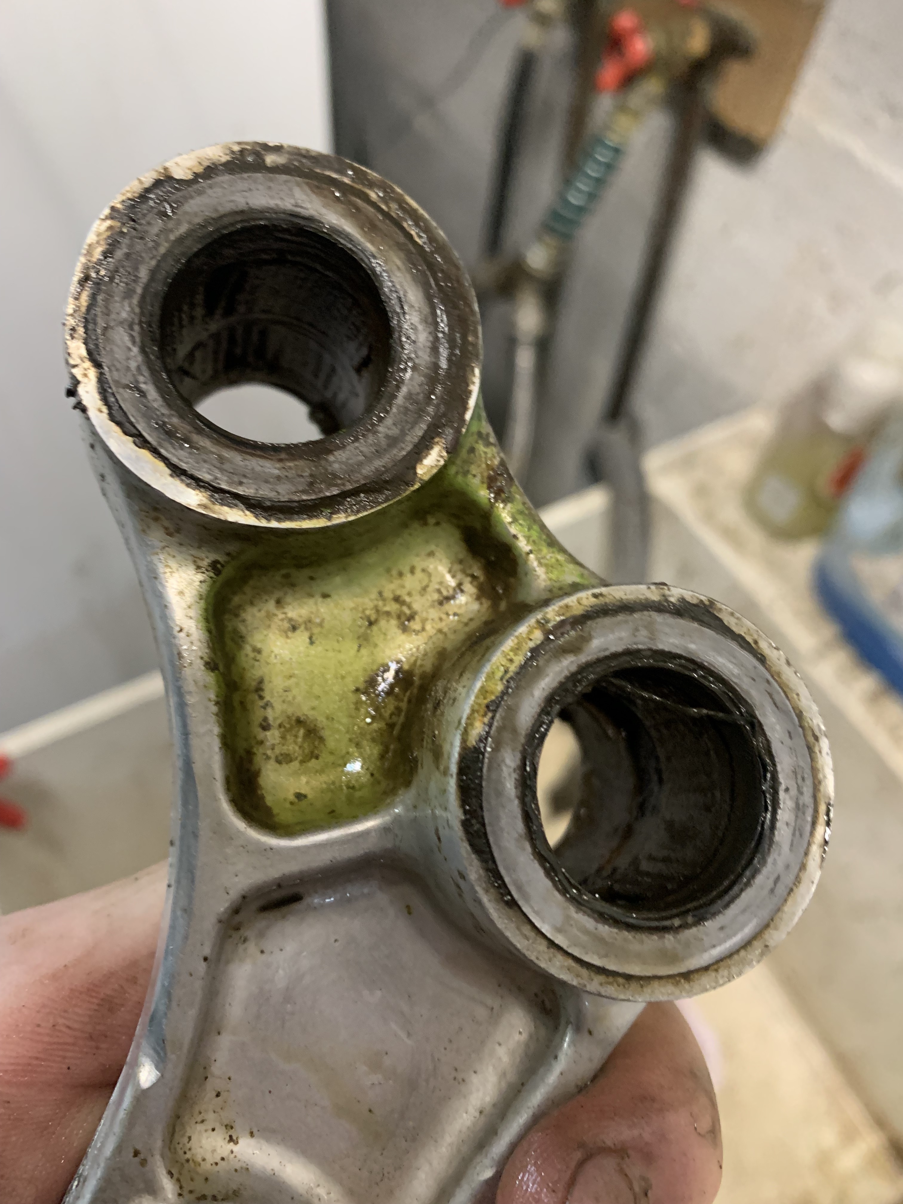 Swingarm bearings shot and oversprayed by PO